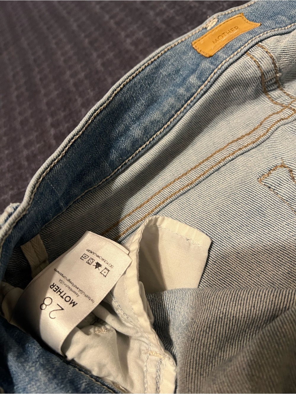 MOTHER Light Wash High-Rise Jeans in Blue
